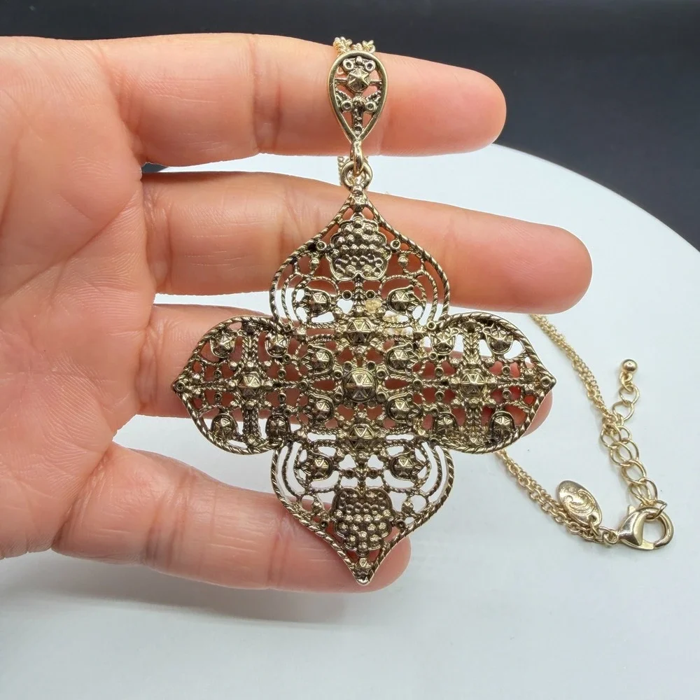 Charming Charlie ornate gold